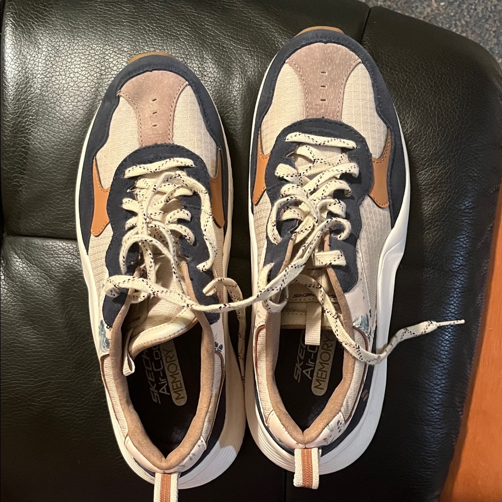 Skechers women’s Cream and Navy Sneakers